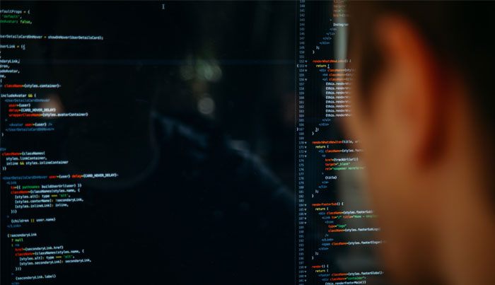 Man working at a computer screen