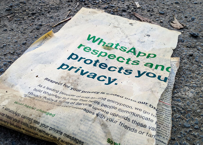 Ripped Newspaper with Whatsapp headline