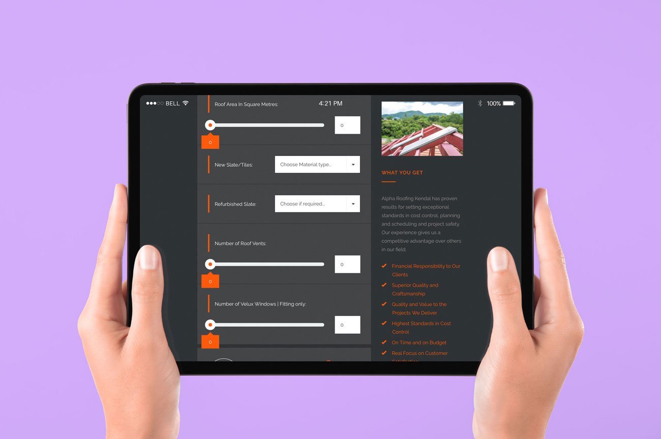 A pair of hands holding a ipad which displays the alpharoofingkendal.co.uk website