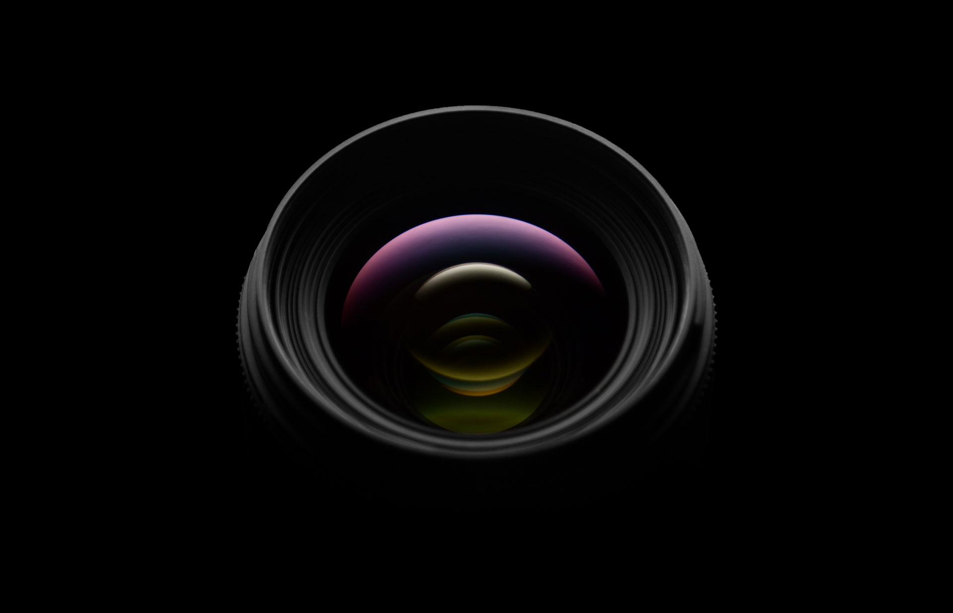 Camera lens on black background