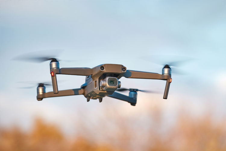 A drone hovers as it shoots film