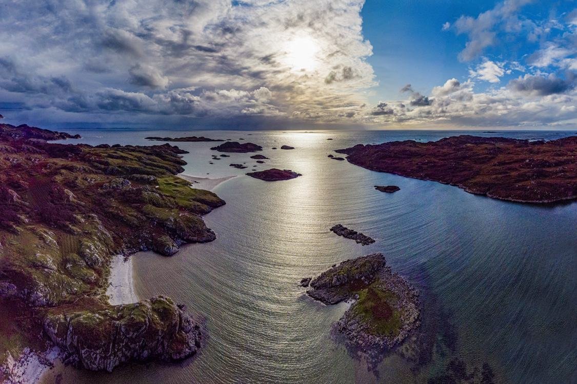 Coastline and rocky islets seen from above at sunset